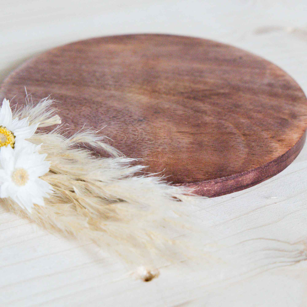 Handgefertigter Kerzenuntersetzer Mangoholz mit Maserung