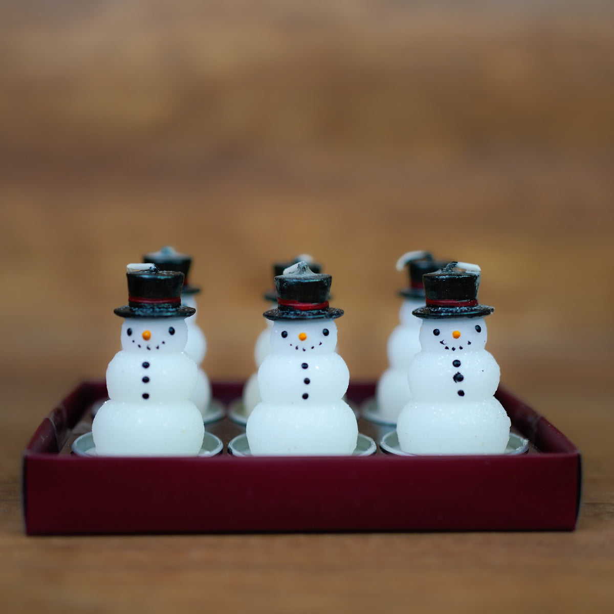 Teelichter 6er Set mit Schneemann-Motiv und schwarzem Zylinderhut
